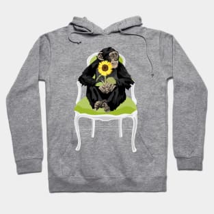 Chimp in a chair with a sunflower Hoodie